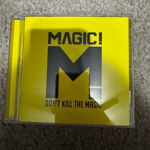 Magic Don’t Kill The Magic Yellow and Black Album Cover